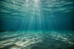 unter Wasser Hintergrund tief Blau Meer und schön Licht Strahlen mit sandig Boden. ai generiert foto