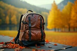 ai Technologie Kunsthandwerk Rucksack und Zubehör gegen ein atemberaubend Herbst Natur Hintergrund ai generiert foto