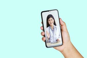 online Arzt Konzept Monitor geduldig Gesundheit durch ein schwarz Smartphone in Verbindung gebracht zu Kommunikation über online Technologie. das Arzt können untersuchen das geduldig über Video Forderung. Ausschnitt Pfad foto
