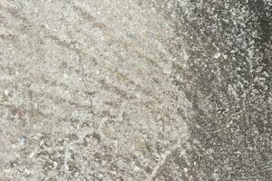 abstrakt alt schmutzig dunkel Zement Mauer Hintergrund auf Boden Textur. foto