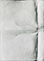 Rau beschädigt Grunge faltig gefaltet gefaltet Papier schneiden. authentisch betrübt Overlay Poster Textur. Staub und kratzen. Oberfläche Textur Hintergrund. Band bewirken foto