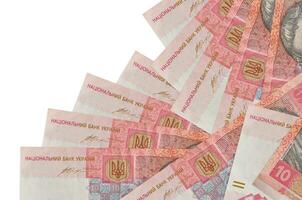 10 ukrainische Griwna-Scheine liegen in unterschiedlicher Reihenfolge isoliert auf Weiß. Konzept für lokales Bankwesen oder Geldverdienen foto