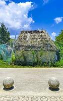 Maya Hütten hölzern Hütte im tropisch Urwald Strand Eingang Mexiko. foto