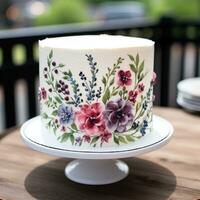einfach Weiß Kuchen mit Aquarell Blumen foto