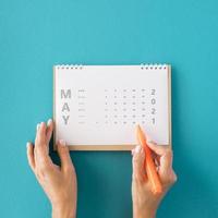 Draufsicht Planer Kalender blauer Hintergrund. hochwertiges schönes Fotokonzept
