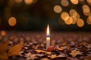 Foto von das Kerze und fallen Blätter Hintergrund