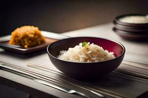 ein Schüssel von Reis mit Essstäbchen und ein Löffel. KI-generiert foto