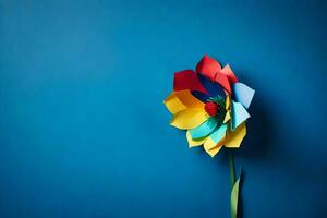 ein bunt Papier Blume auf ein Blau Hintergrund. KI-generiert foto