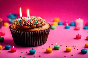 ein Cupcake mit Kerzen auf ein Rosa Hintergrund. KI-generiert foto