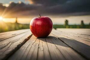 ein Apfel sitzt auf ein hölzern Tabelle im Vorderseite von ein Sonnenuntergang. KI-generiert foto