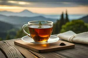 ein Tasse von Tee auf ein hölzern Tabelle mit Berge im das Hintergrund. KI-generiert foto