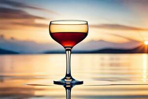 ein Glas von Wein auf das Strand beim Sonnenuntergang. KI-generiert foto