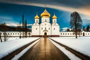 ein Weiß Kirche mit Gold Kuppeln im das Schnee. KI-generiert foto