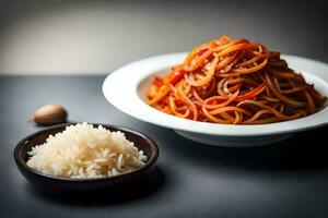 ein Teller von Spaghetti mit ein Schüssel von Reis. KI-generiert foto