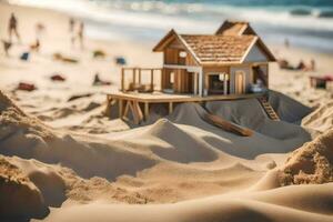 ein Miniatur Haus auf das Strand mit Menschen im das Sand. KI-generiert foto