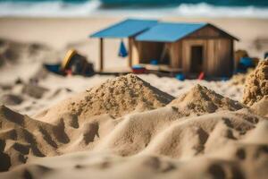 ein Spielzeug Haus auf das Strand mit Sand und Wasser. KI-generiert foto