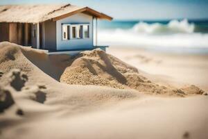 ein Miniatur Haus auf das Strand mit Sand. KI-generiert foto