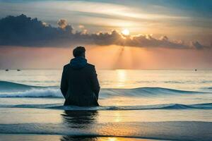 ein Mann Sitzung auf das Strand beim Sonnenuntergang. KI-generiert foto