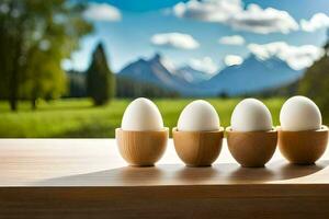 vier Eier im hölzern Tassen auf ein Tabelle mit Berge im das Hintergrund. KI-generiert foto