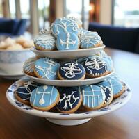 nautisch Thema mit Blau und Weiß Dekor, Anker, und Segelboot Kekse foto