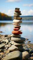 Küsten Steinhaufen Steine vereinbart worden im ein Strand Pyramide, ein still und natürlich Monument Vertikale Handy, Mobiltelefon Hintergrund ai generiert foto