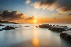 ein schön Sonnenuntergang Über das Ozean mit Felsen und Wasser. KI-generiert foto