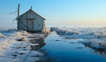 minimalistisch Winter Landschaft durch das Wasser, mit ein hölzern Kabine. ai generiert foto