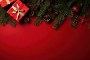 Weihnachten Hintergrund mit Tanne Geäst, Zapfen und Geschenk Box auf rot Hintergrund ai generiert foto