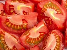 frisch rot Tomaten wie Hintergrund foto