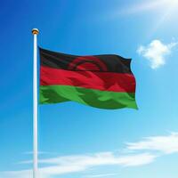 winken Flagge von Malawi auf Fahnenstange mit Himmel Hintergrund. foto