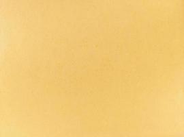 ein alter gelber Papierschmutzbeschaffenheitshintergrund foto