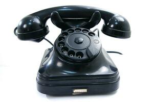 ein schwarz Telefon auf ein Weiß Hintergrund foto