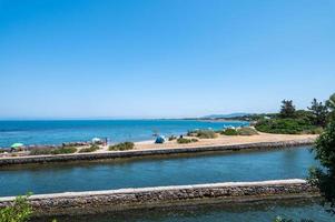 Blick auf eine Bucht in Porto Santo Stefano foto