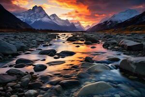 schön Berg Landschaft mit ein Fluss und schneebedeckt Spitzen, klar Fluss mit Felsen führt gegenüber Berge zündete durch Sonnenuntergang, ai generiert foto