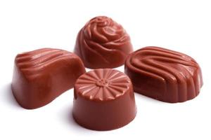 vier Schokoladenbonbons foto