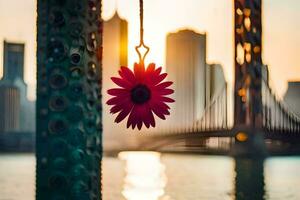 ein rot Blume hängend von ein Pole im Vorderseite von ein Stadt Horizont. KI-generiert foto