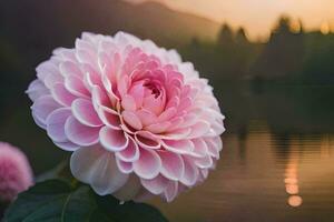 ein Rosa Blume ist im Vorderseite von ein See. KI-generiert foto