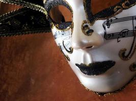 Karneval Venedig Theaterkostüm bunte Maske foto