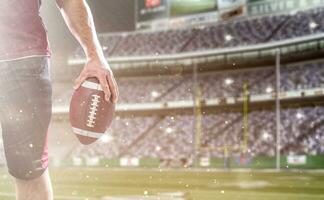 Closeup American Football-Spieler isoliert auf großen modernen Stadion foto