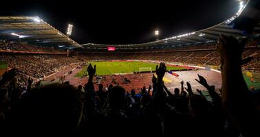 Fußballfans unterstützen ihre Lieblingssportmannschaft foto