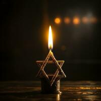 ein Kerze brennt gegen das Hintergrund von das Star von David foto