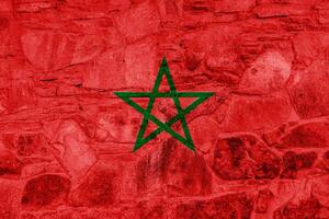 Flagge von Königreich von Marokko auf ein texturiert Hintergrund. Konzept Collage. foto