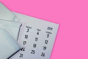 monatlich Kalender und sanitär Pads. Menstruation Zyklus Kalender. Frauen Gesundheit Konzept foto