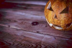 Halloween Kürbis auf Holz foto