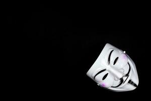 anonym Maske auf schwarz foto