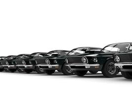Reihe von klassisch schwarz Muskel Autos foto