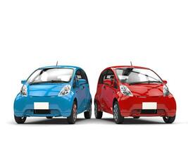 Blau und rot klein ecomonic elektrisch Autos Seite durch Seite foto