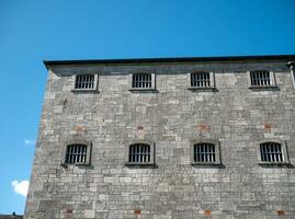 alt keltisch Schloss Turm Wände, Kork Stadt Gefängnis Gefängnis im Irland. Festung, Zitadelle Hintergrund foto