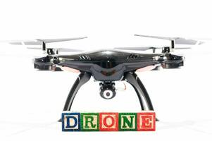 ein isoliert Drohne mit Blöcke Rechtschreibung Drohne foto
