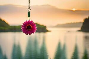ein Rosa Blume hängend von ein Haken im Vorderseite von ein See. KI-generiert foto
